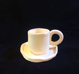 Handmade ceramic mug and saucer set, design Maniko dearte          Ask ChatGPT