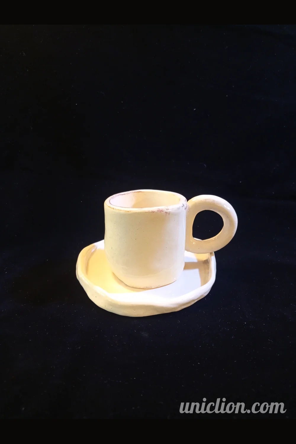 Handmade ceramic mug and saucer set, design Maniko dearte          Ask ChatGPT