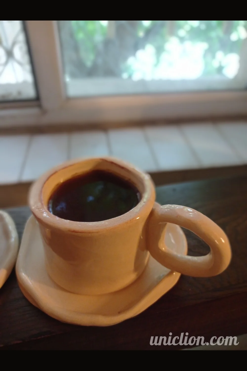 Handmade ceramic mug and saucer set, design Maniko dearte          Ask ChatGPT